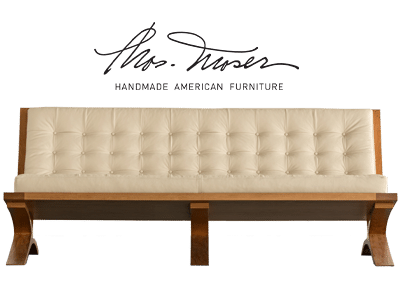 thos moser logo and sofa